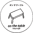 ON THE TABLE